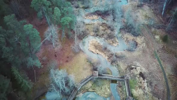 Park in Forest With Wooden Statues of Gnomes, Monsters.  Aerial View of the Wooden Castle 4K Video