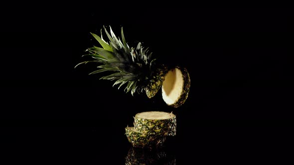 Pineapple Divide Into Slices in Black Background 