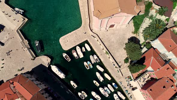 Aerial view above of Veli Losinj old town during the day, Croatia.