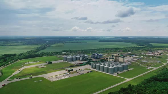 Metal grain facility with silos. Group of granaries for storing wheat and other cereal grains