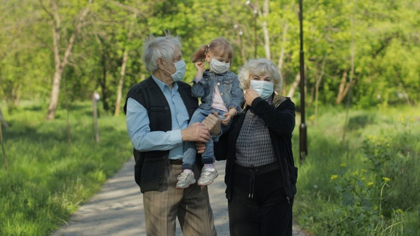 Family of Grandparents Takes Off Medical Masks After Coronavirus Quarantine End