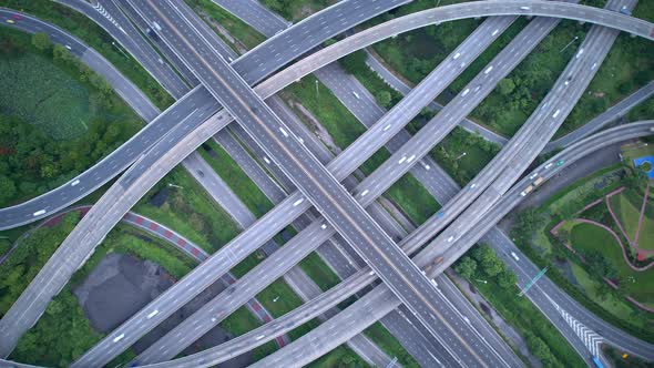 Aerial view shot of fast moving above interchange and multi junction road