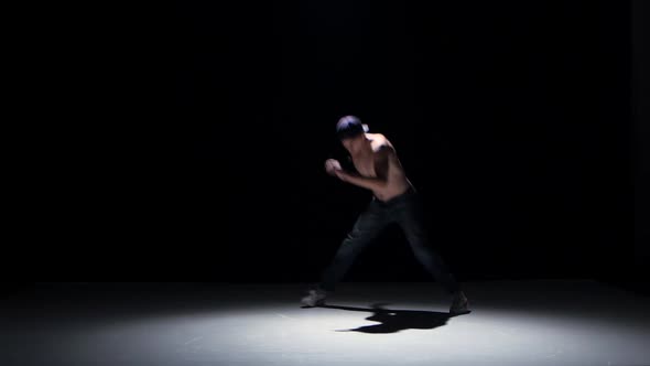 Breakdance Dancer Man with Naked Torso Dance on His Hands, Black, Shadow