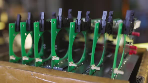 Slider Shot of a PCB Microcircuits in Workshop Laboratory