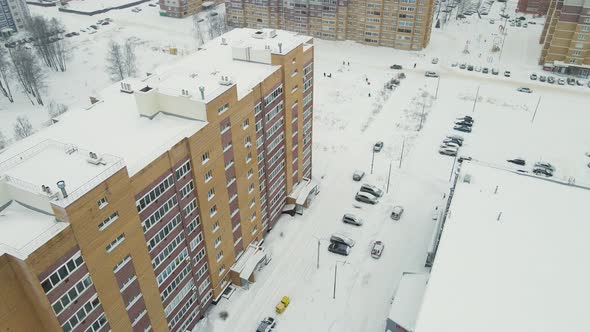Modern Highrise Buildings Covered with Snow After a Severe Blizzard
