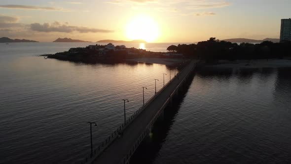 dramatic aerial sunset over Puente de Toralla and Isla de Toralla (Bridge and Toralla Island) City o