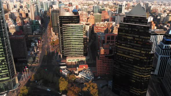 Aerial reveal of traffic from buildings perspective, Santiago de Chile-4K