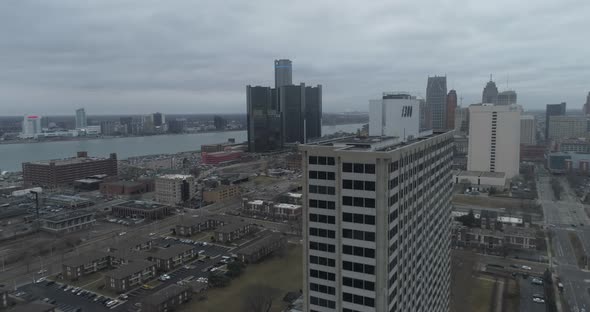 Aerial view of downtown Detroit and surrounding neighborhood on a cloudy and gloomy day. This video