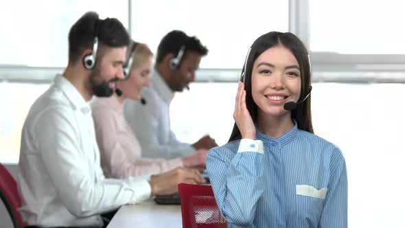Call Center Young Brunette Woman Cheering Up.