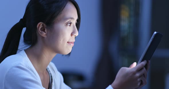 Woman use of tablet computer at home