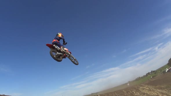 Men racing in a motocross motor sports race.