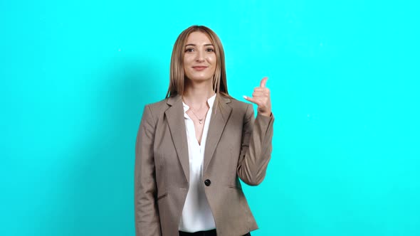 The Happy Young Woman Shows a Gesture with Her Hand, Support Service, Call Center.