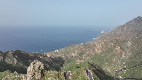 Aerial Drone View of a Wild Touristic Twisty Road in the Green Lush Mountains Along the Atlantic