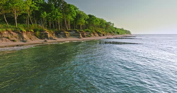 Sunset on Baltic Sea and empty beach in summer