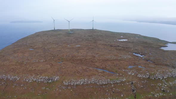 Aerial View of Wind Turbines and Ocean