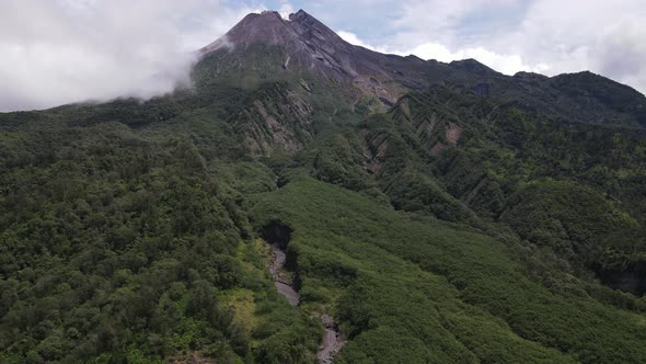 Aerial view of active Merapi mountain with clear sky in Indonesia