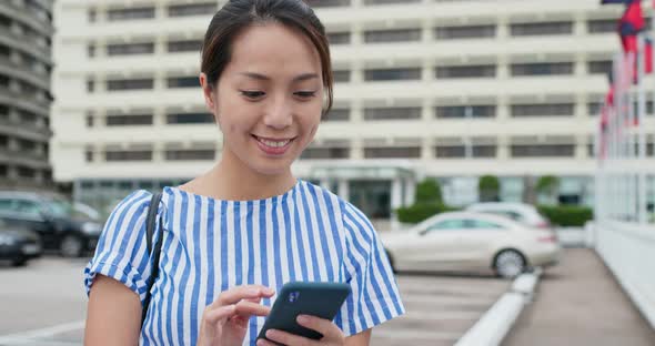 Woman Use of Mobile Phone in Hong Kong City