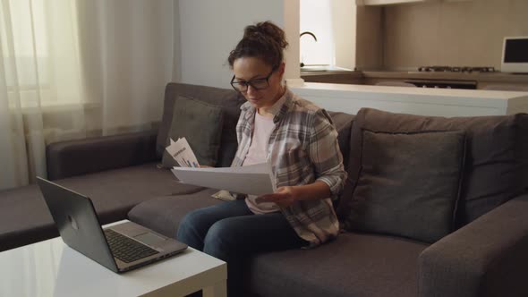 Female Manager Overworking at Home Crying Throwing Papers in the Air