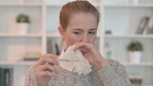 Portrait of Sick Young Woman Checking Temperature By Thermometer