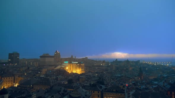 Evening View of Genoa Port with Thunderstorm, Italy