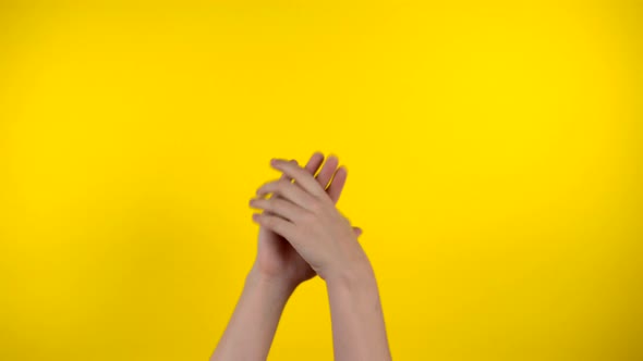 Applause Clapping Hands on Yellow Background Gesturing Hands