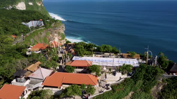 Fly over Uluwatu temple while there is a ceremony