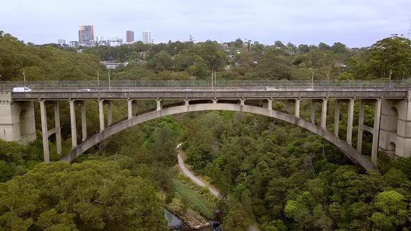 Long Gully Suspension Bridge in Northbridge, Sydney Australia, Aerial drone right side tracking shot