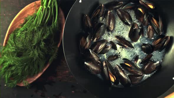 Super Slow Motion in the Pan are Boiled Mussels with Air Bubbles