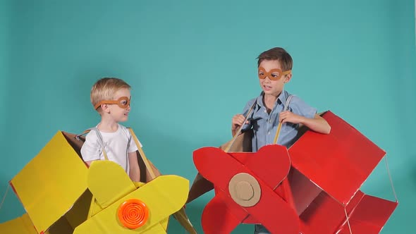 Two Children Visionaries Imagine Flight in Airplane in Sky. Playing Together