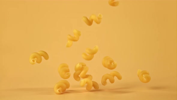 Super Slow Motion of the Kavatappi Dry Pasta Falling