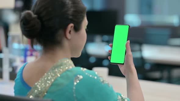 Indian Woman using Smartphone with Chroma Key Screen