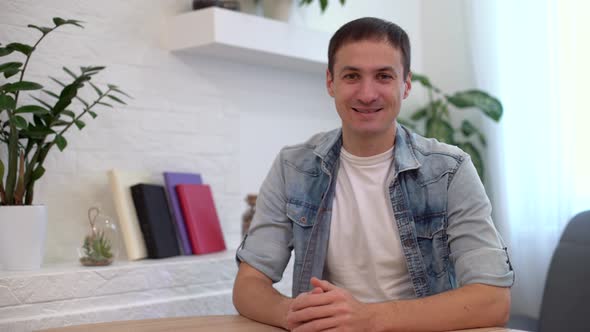 Businessman Making Video Call Looking at Camera and Talking Discussing Strategy Partners Online