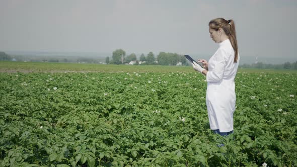 Scientist use digital tablet outdoors