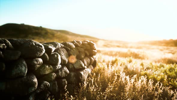 Scottish Land Border Stone Wall at Sunset