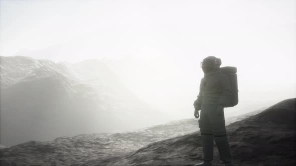 Astronaut on Another Planet with Dust and Fog