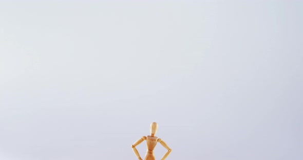 Figurine standing with hands on hip