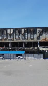 Vertical Video of a Destroyed Building of a Shopping Center in Bucha Ukraine