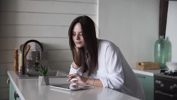 Girl browsing social networks on tablet