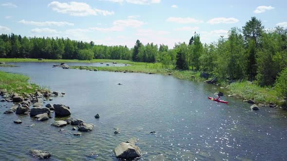 Kayaking in clear water archipelago and beautiful nature of Finland, Aerial, copyspace