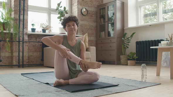 Cheerful Woman Doing Yoga and Posing