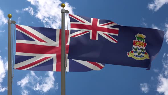 United Kingdom Flag Vs Cayman Islands Flag On Flagpole