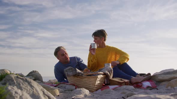 Couple enjoying free time by the sea