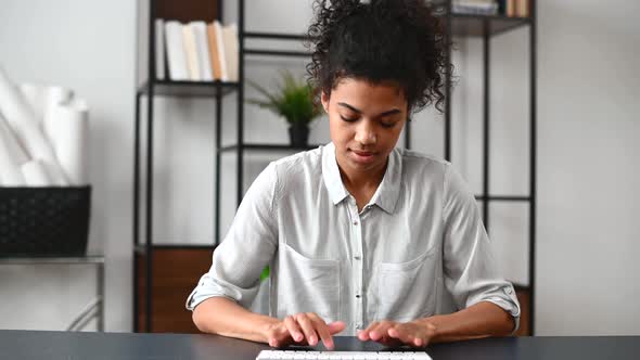 Confident AfricanAmerican Female Office Employee