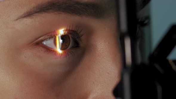 Close Up View of The Ophthalmologist Examines the Patient's Eye