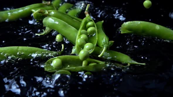 Falling of Green Peas in Water