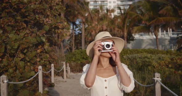 Young photographer in the morning in Miami. Shot on Black Magic Cinema