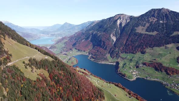 Amazing view to three different blue lakes in between a green valley in Switzerland (Lungernsee)