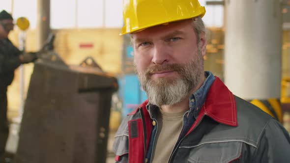 Portrait of Experienced Factory Worker in Hardhat