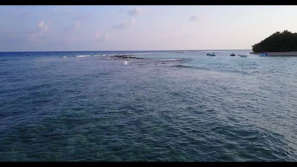 Aerial top down nature of luxury coastline beach journey by turquoise sea and white sandy background