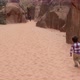 Rear view of boy running in Wadi Rum Desert, Jordan - VideoHive Item for Sale